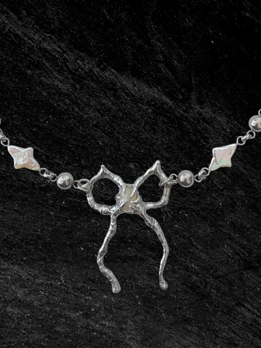 Spiky Bow and Pearl Necklace