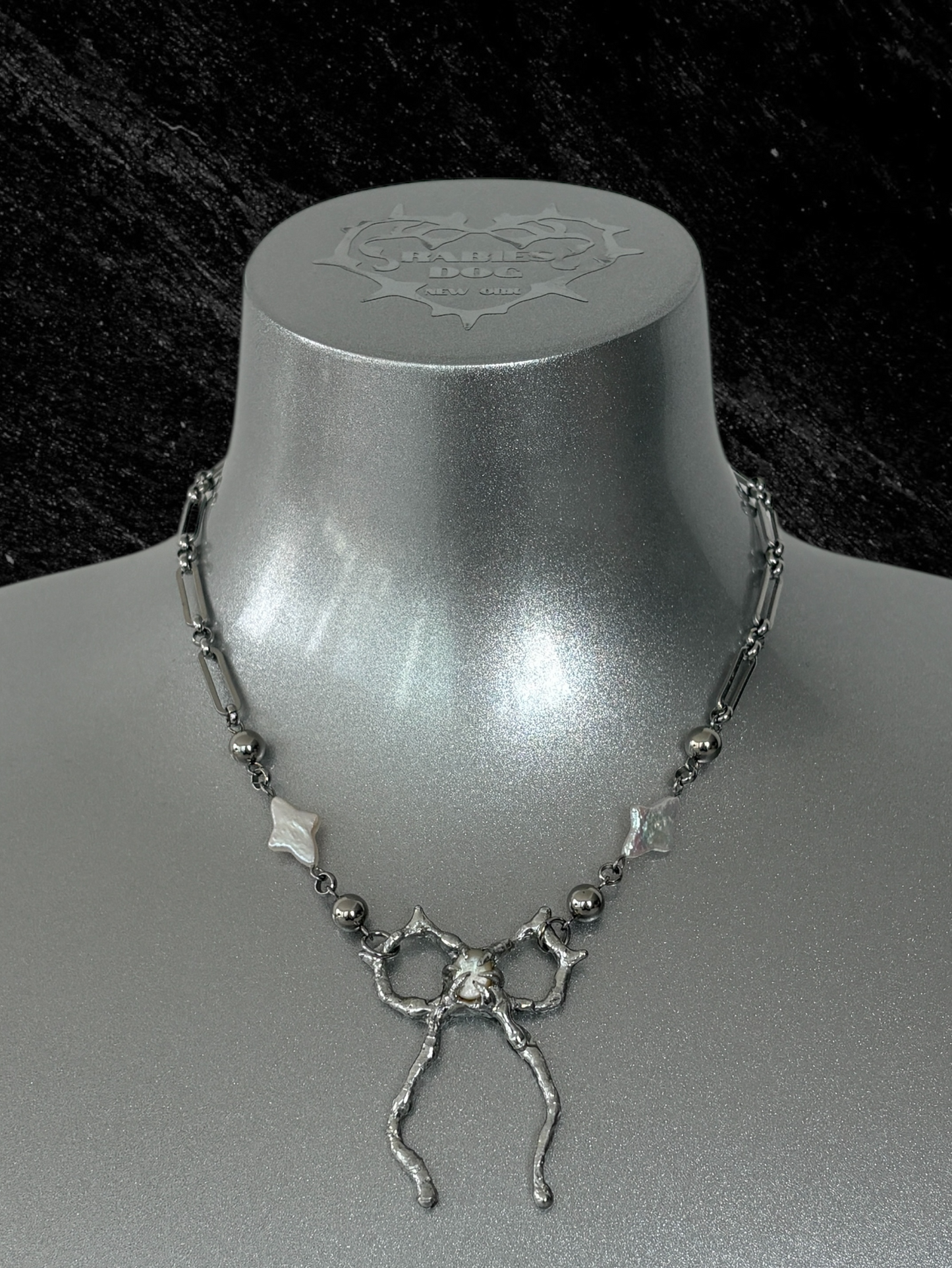Spiky Bow and Pearl Necklace