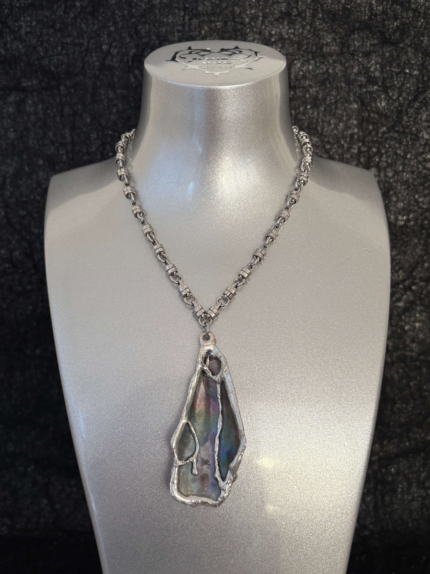 Handcrafted mussel shell necklace by RABIES DOG with organic shell and sculptural soldered metal details