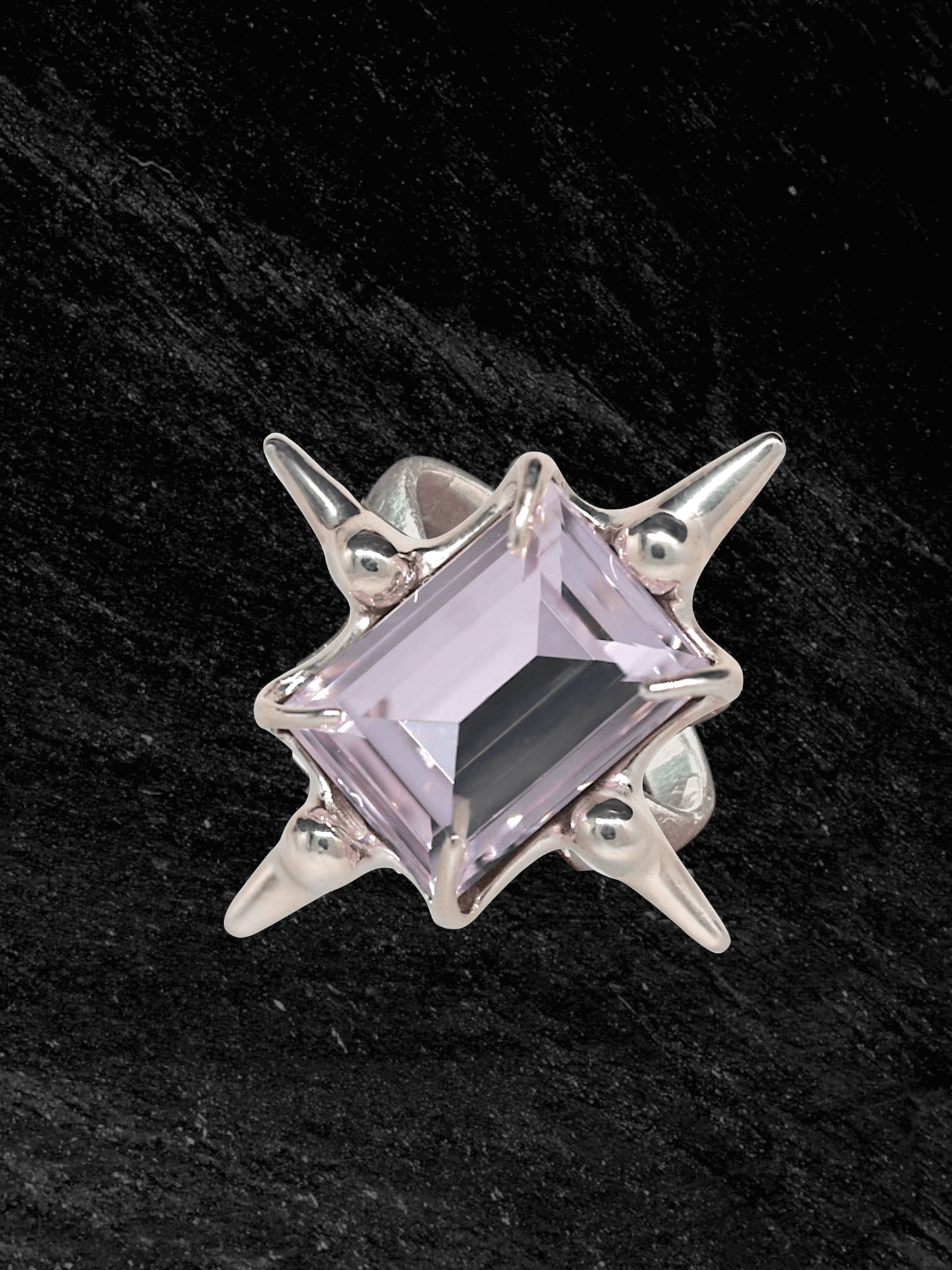 “Astroid Ring in S925 sterling silver, engraved with RABIES DOG and designed as an adjustable open band.”