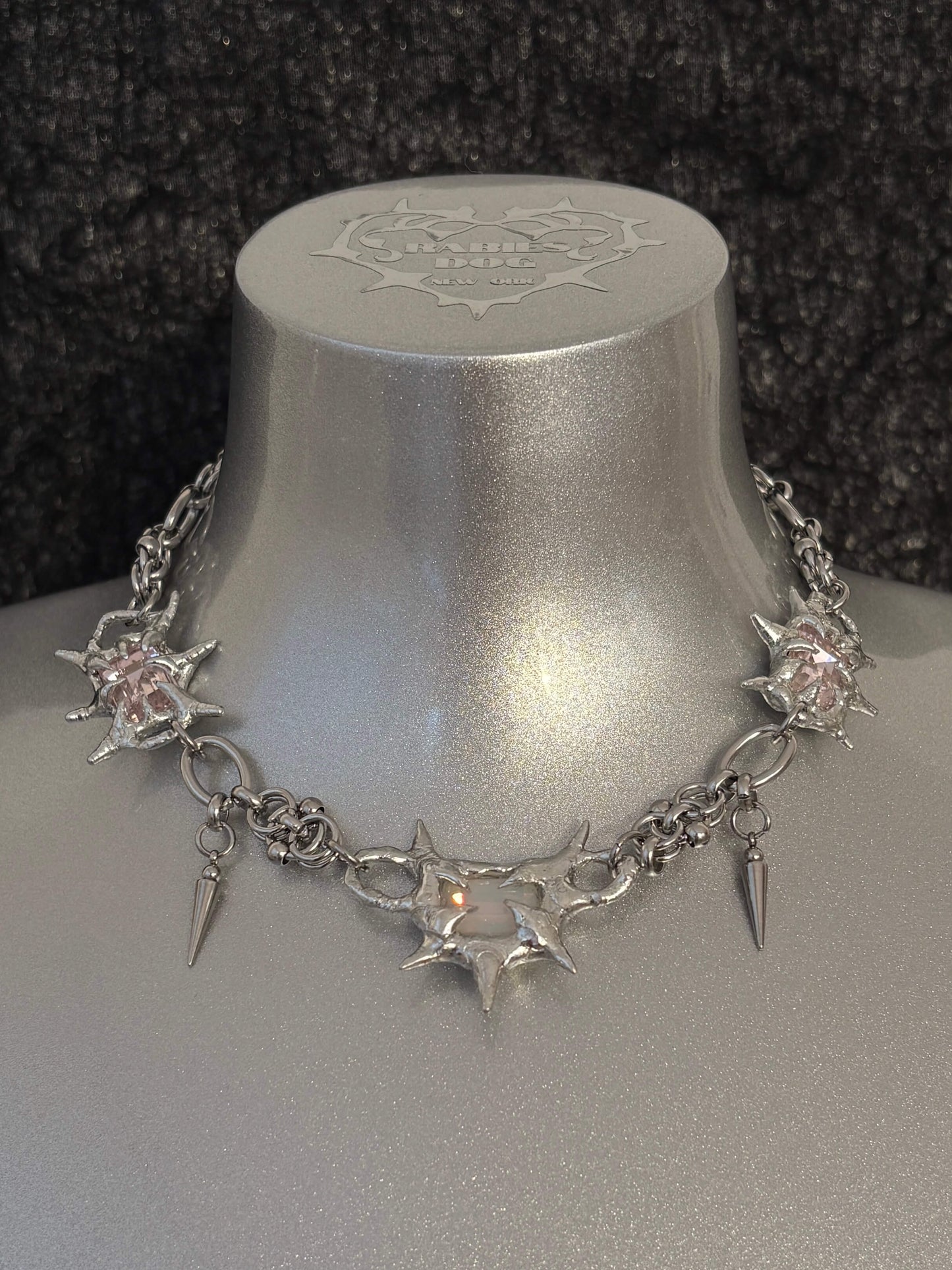 “Softlight Crystal Necklace by RABIES DOG, handcrafted with a soldered setting and a soft-glow crystal accent.”