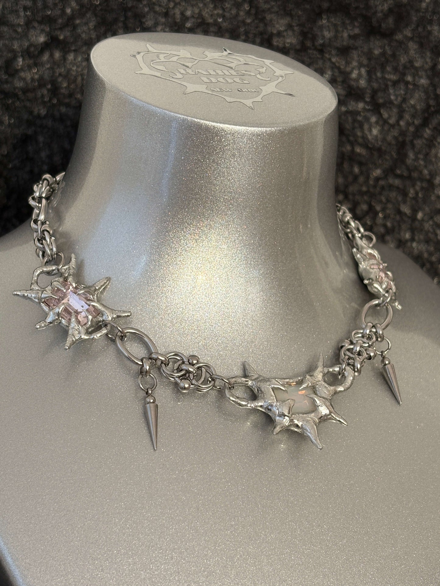 “Softlight Crystal Necklace by RABIES DOG, handcrafted with a soldered setting and a soft-glow crystal accent.”