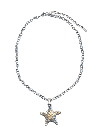 “Littlestarfish Necklace by RABIES DOG, featuring a real starfish, carefully soldered and UV sealed for preservation.”