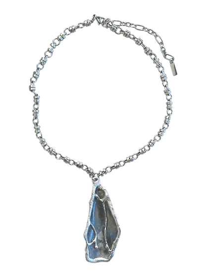 Handcrafted mussel shell necklace by RABIES DOG with organic shell and sculptural soldered metal details