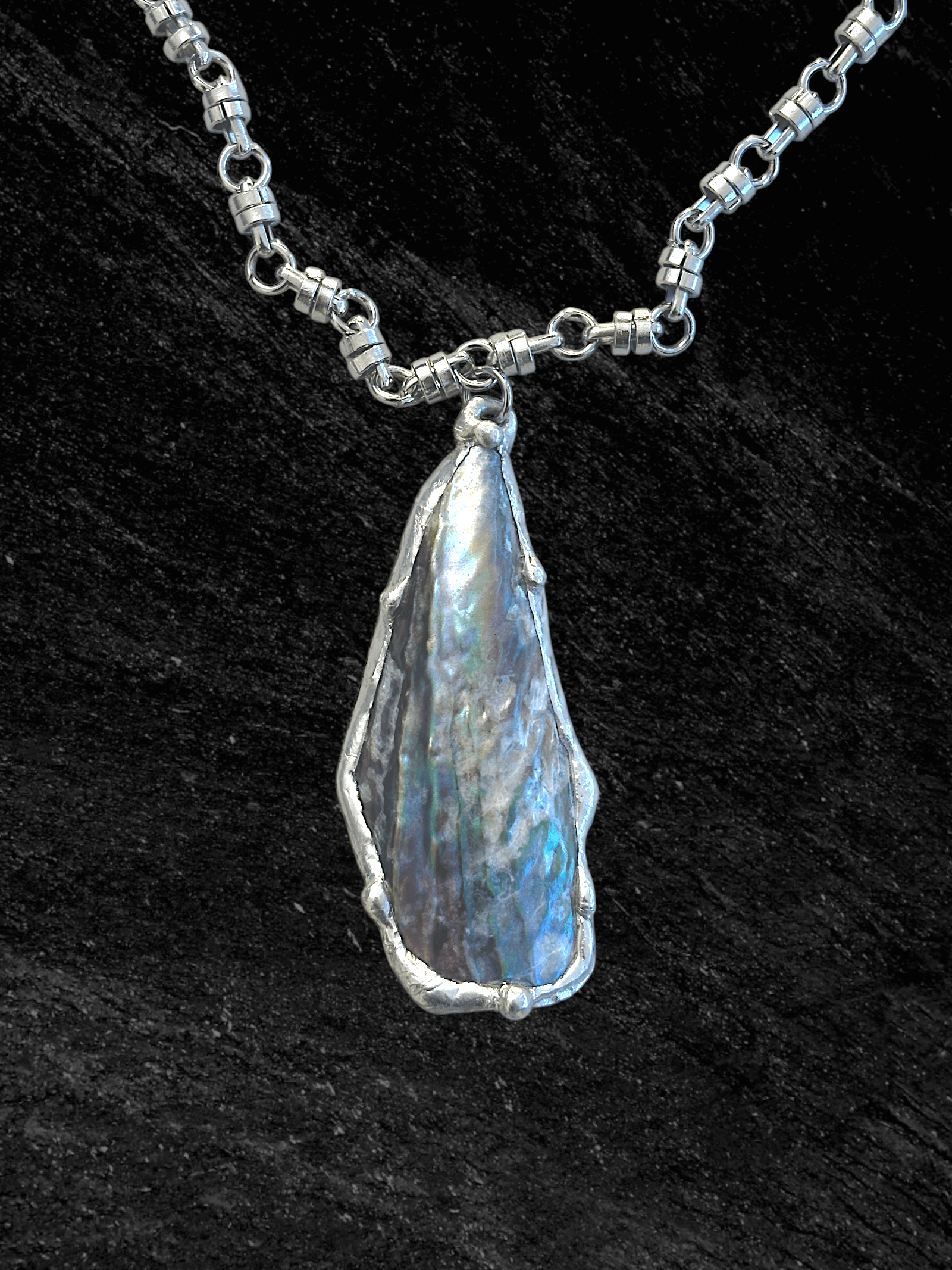 Handcrafted mussel shell necklace by RABIES DOG with organic shell and sculptural soldered metal details