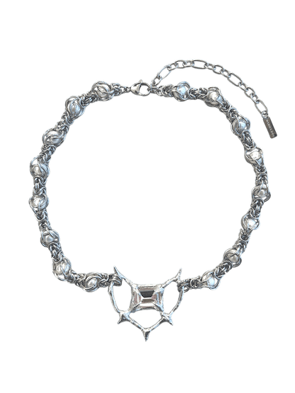 Pearl Antler necklace by RABIES DOG, handcrafted soldered metal necklace with pearls and organic antler-inspired form, front view on dark background