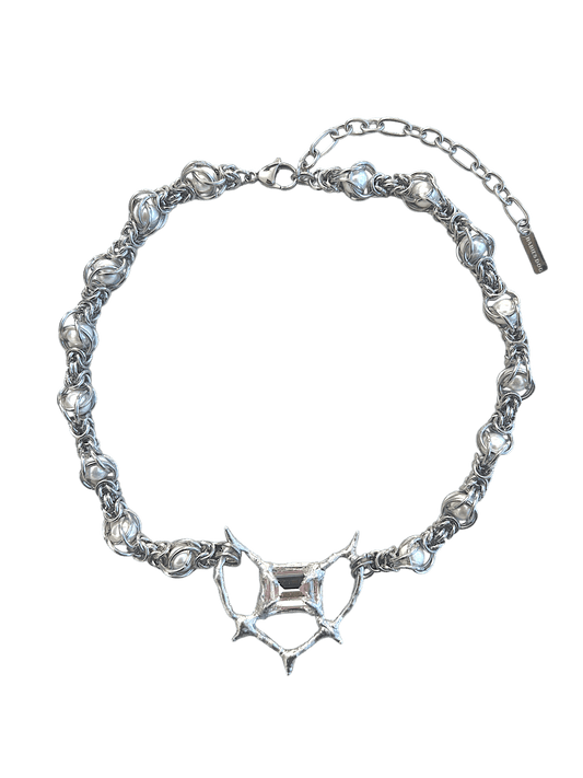 Pearl Antler necklace by RABIES DOG, handcrafted soldered metal necklace with pearls and organic antler-inspired form, front view on dark background