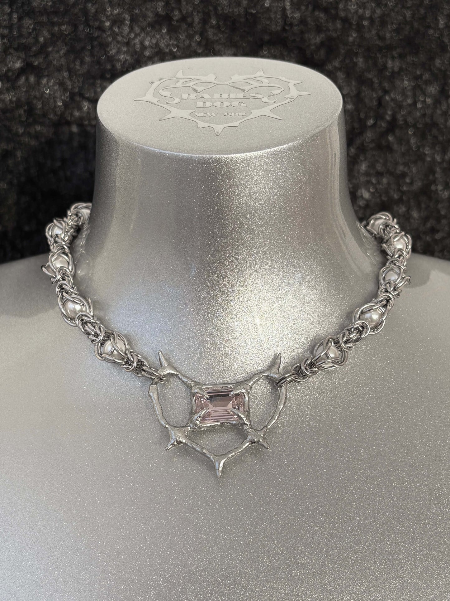 Pearl Antler necklace by RABIES DOG, handcrafted soldered metal necklace with pearls and organic antler-inspired form, front view on dark background