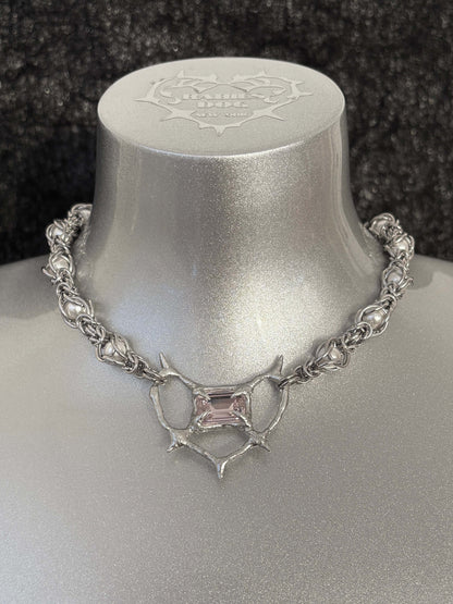 Pearl Antler necklace by RABIES DOG, handcrafted soldered metal necklace with pearls and organic antler-inspired form, front view on dark background