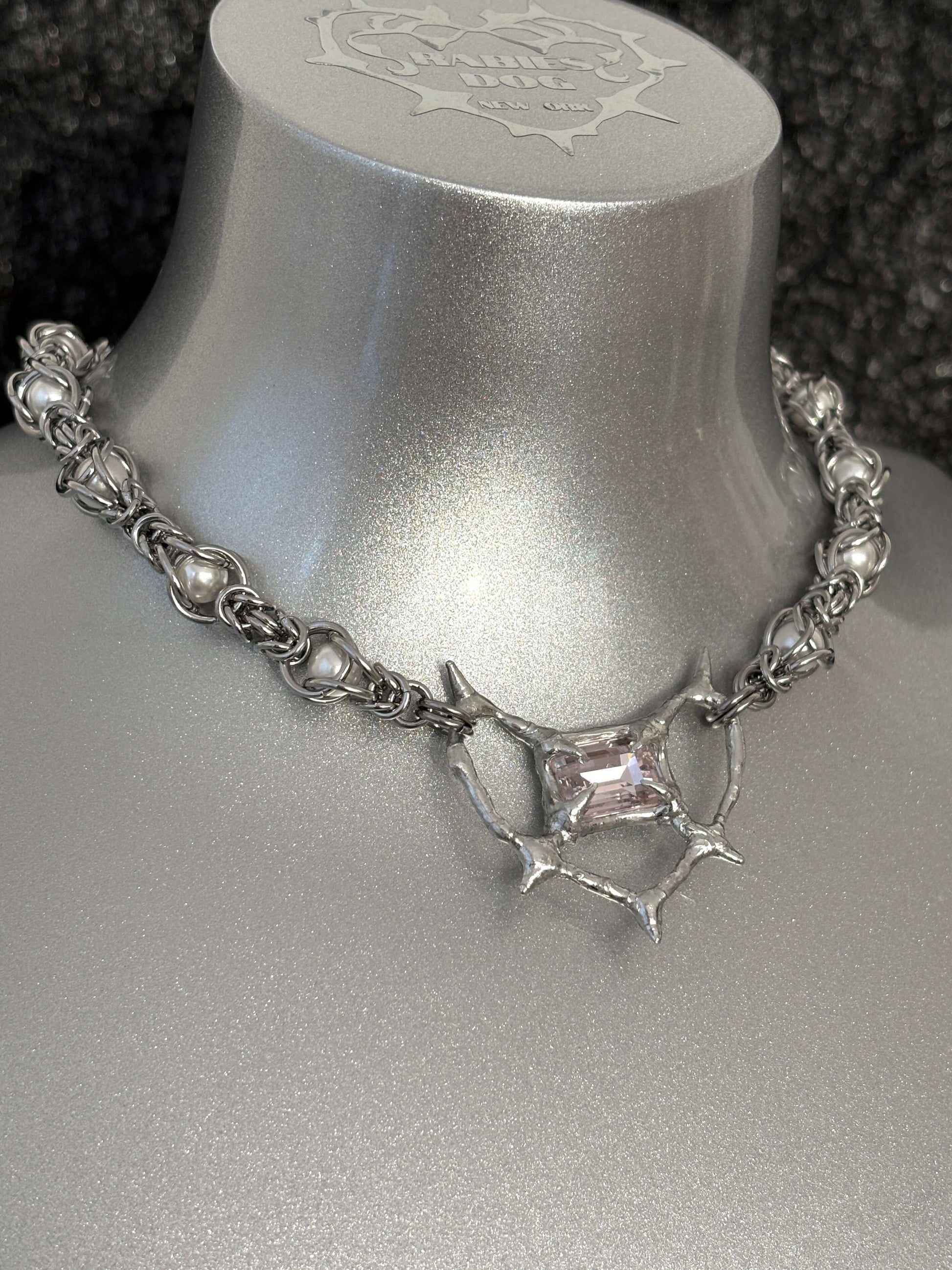 Pearl Antler necklace by RABIES DOG, handcrafted soldered metal necklace with pearls and organic antler-inspired form, front view on dark background