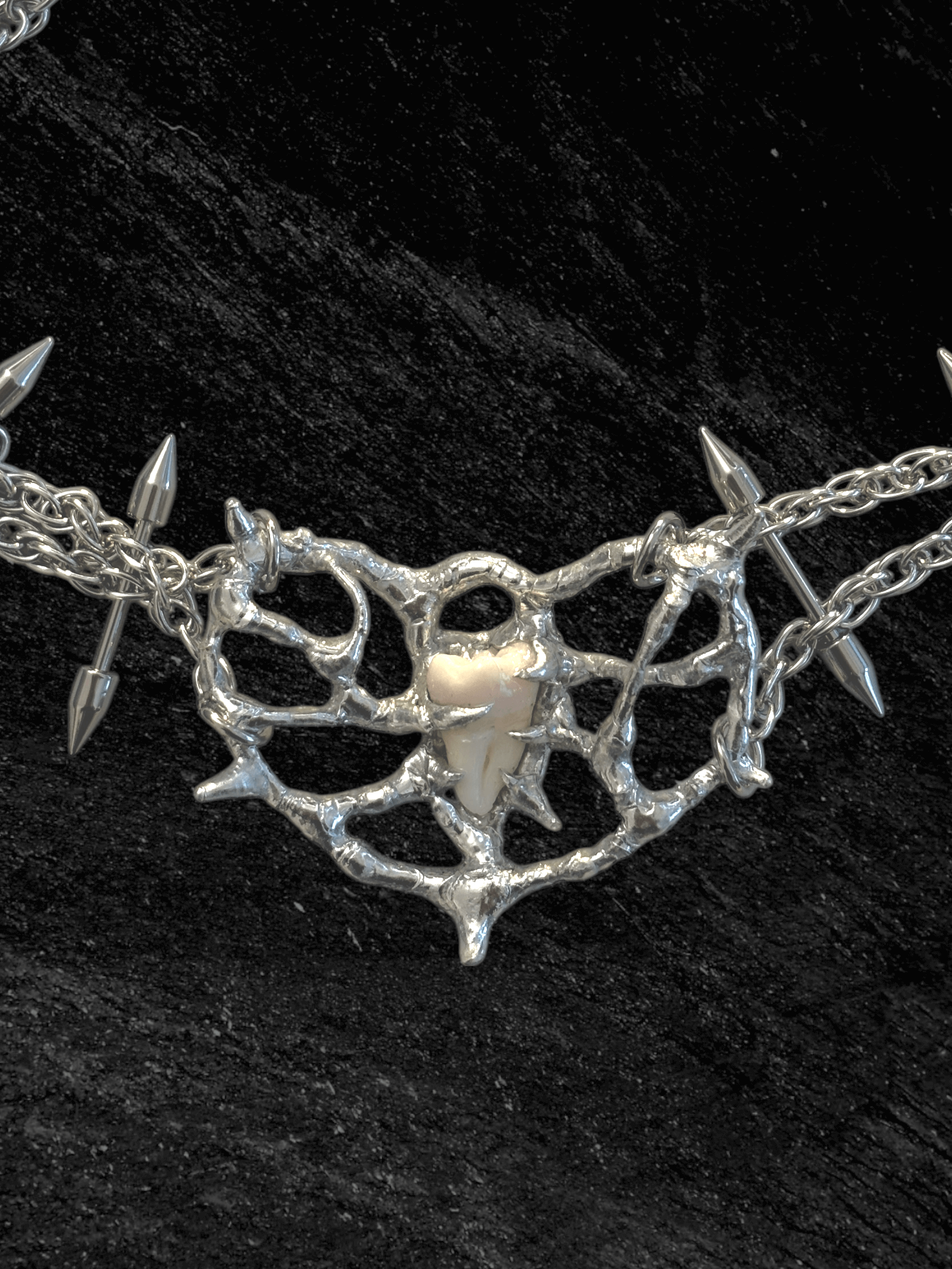 Tooth Fairy necklace by RABIES DOG, handcrafted soldered metal necklace designed for customization using customer-provided wisdom tooth or bone.