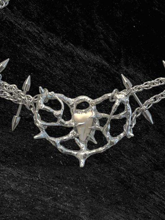 Tooth Fairy necklace by RABIES DOG, handcrafted soldered metal necklace designed for customization using customer-provided wisdom tooth or bone.